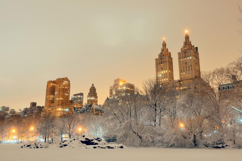 Central Park winter at night with skyscrapers in midtown Manhattan New York City