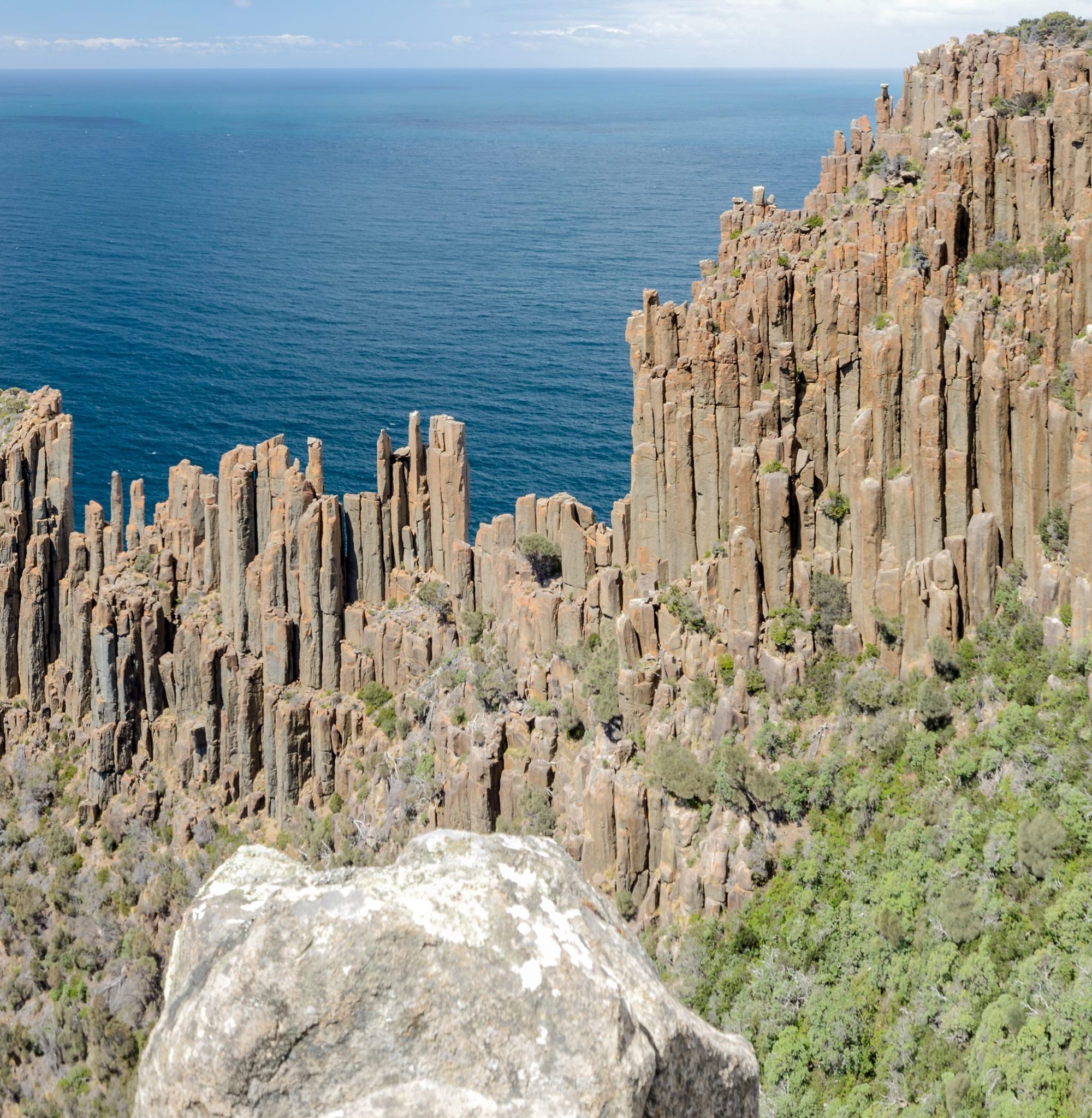Panoramic, elevated view of Cape Raoul with its impressive formation of dolerite columns. Tasman National Park, Tasmania, Australia.
