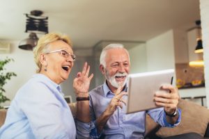 senior people using digital device